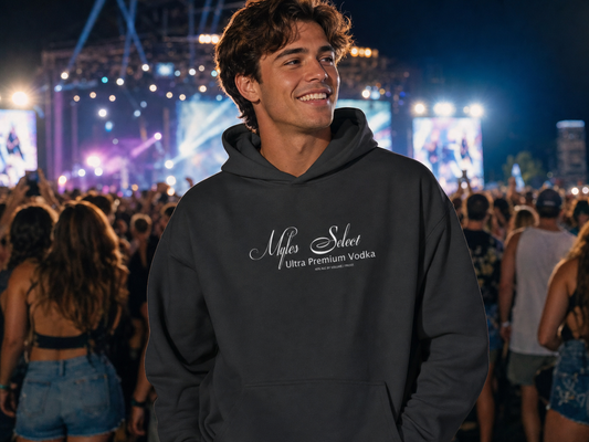 Myles Select Vodka hoodie lifestyle — model at outdoor festival at night